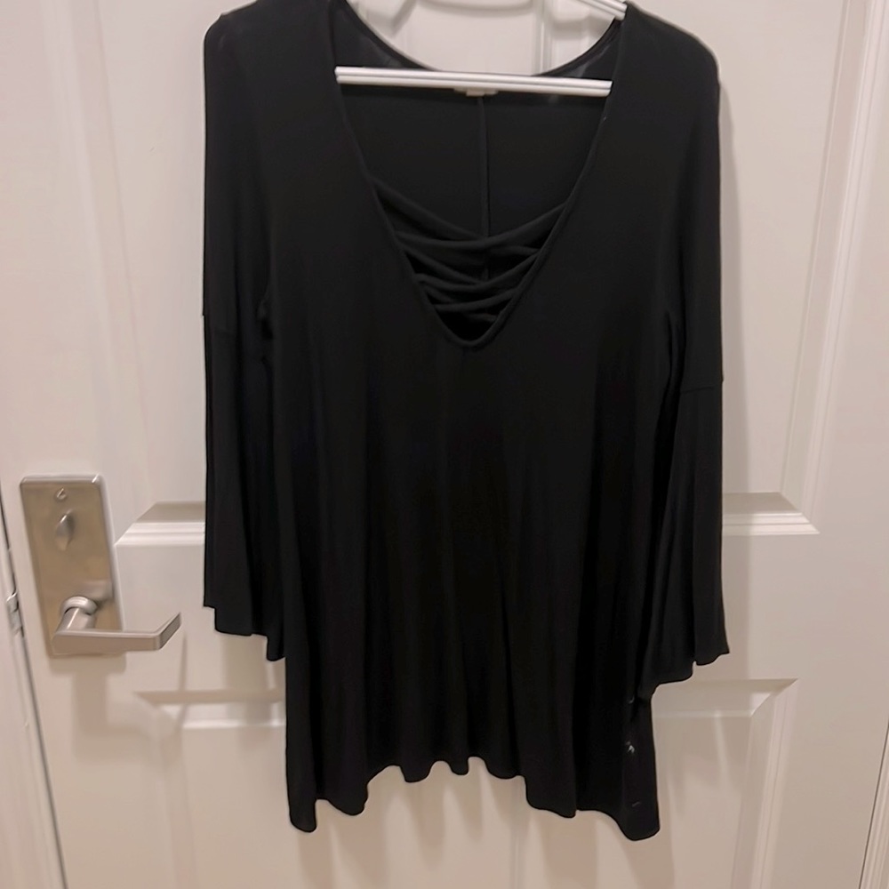 Black criss cross top with flared sleeves